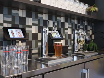 Complimentary beer & wine on tap